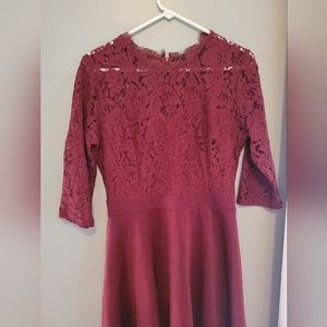 Large maroon half lace dress. Quarter sleeves and knee high length